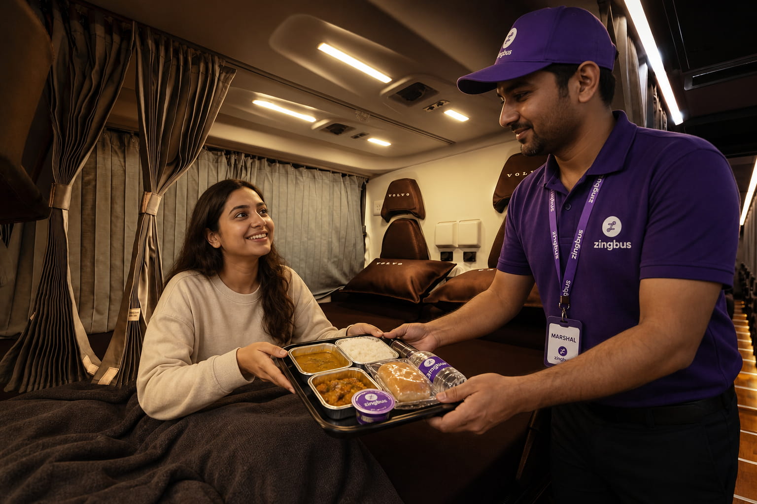 Passenger receiving a meal tray from a marshal in the aisle of a zingbus intercity coach