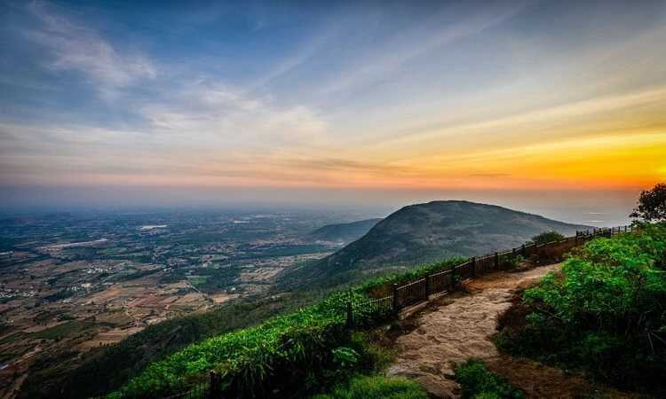 Misty sunrise view from Nandi Hills, one of the best weekend getaways from Bangalore under ₹5000