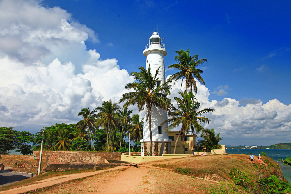 Colourful French colonial villas and bougainvillaea on White Town lane in Pondicherry budget travel guide 2026