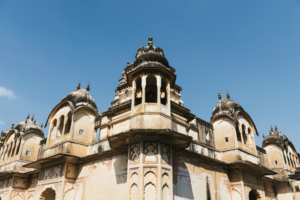 Places to visit near Lucknow under 100 km - the Gomti river ghats at Naimisharanya and the Kanpur skyline during a North India day trip