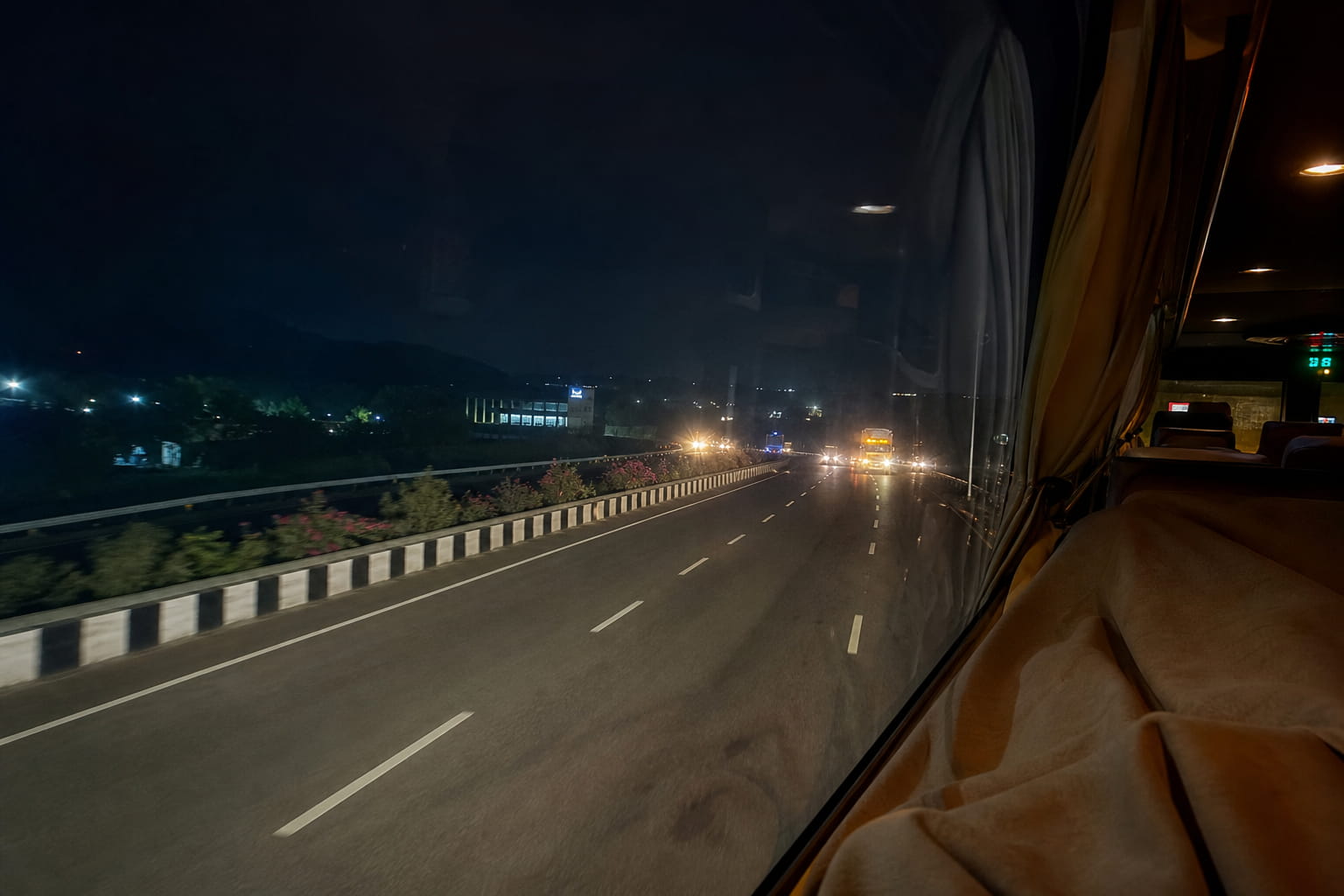 Sleeper bus travelling from Pune to Nagpur on an intercity highway