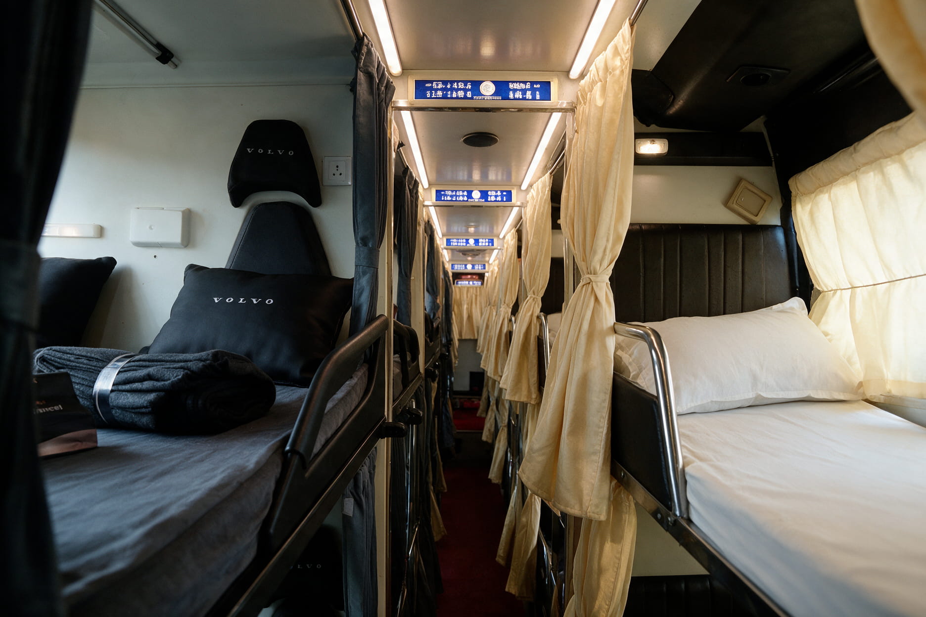 A zingbus Maxx flat berth next to a zingbus Plus sleeper cabin